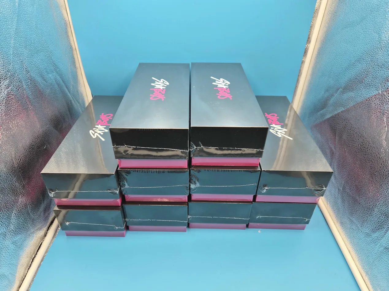 K-pop album boxes stacked and counted